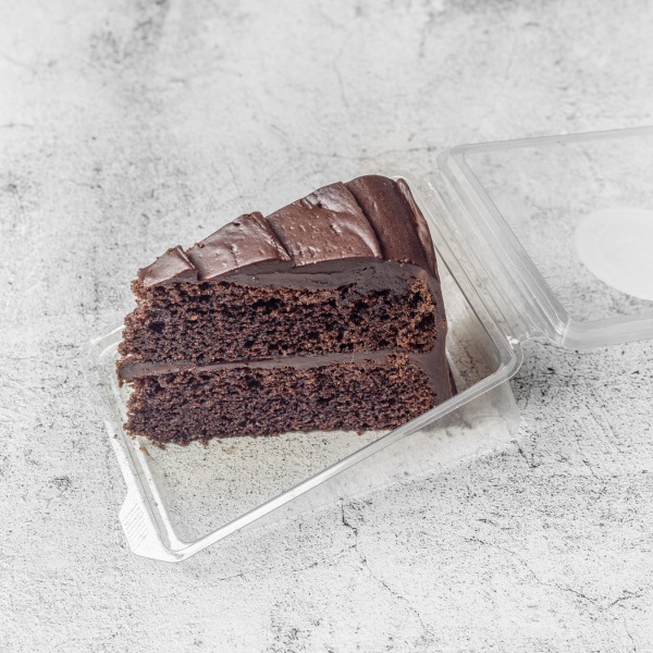 A slice of rich chocolate layer cake with creamy chocolate frosting at Dizato Dessert Parlour in 
Perth. 