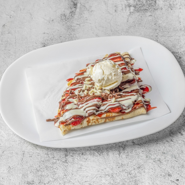 Strawberry chocolate crepe with vanilla ice cream served fresh at Dizato Dessert Parlour.
